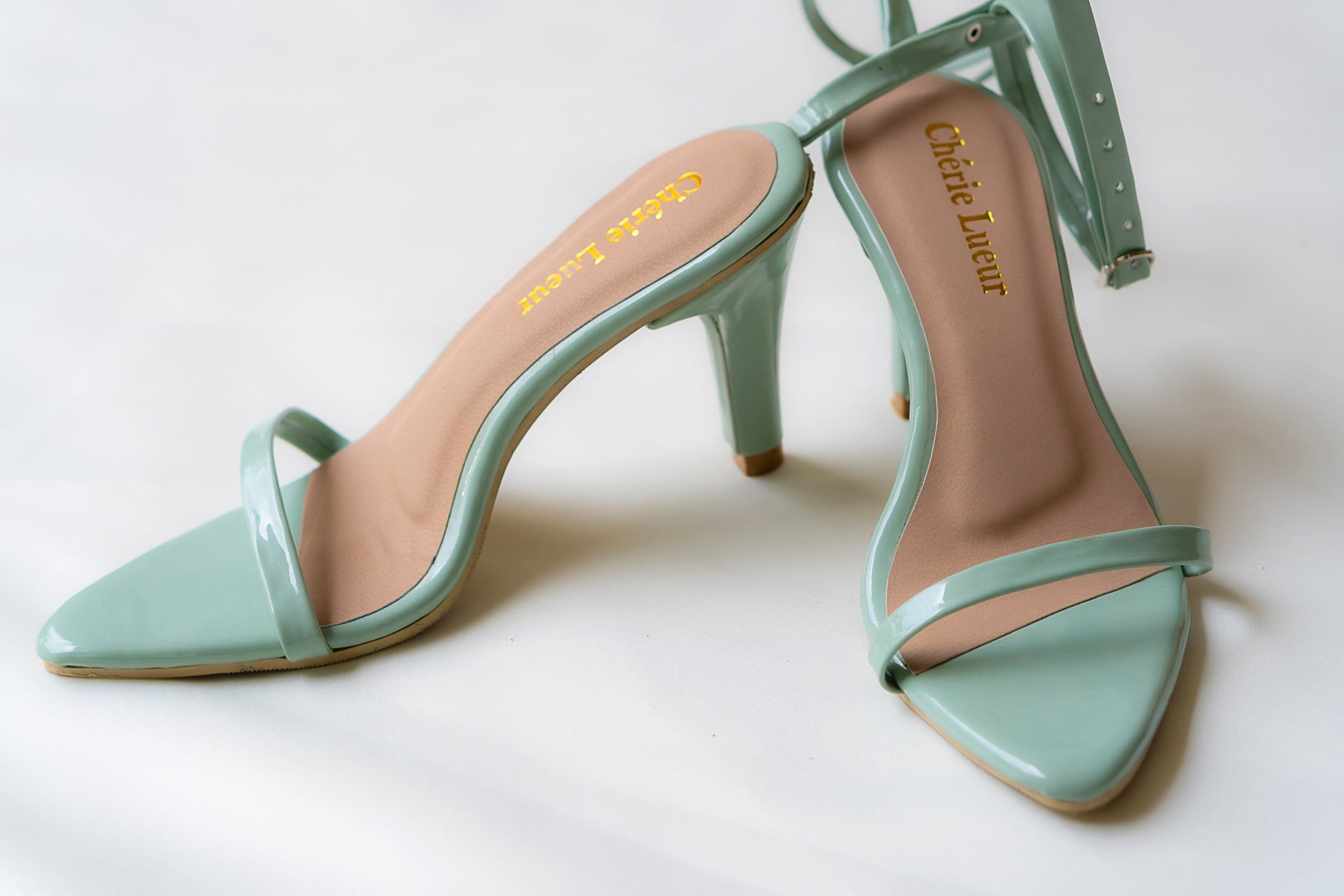 Charming mint green heel with a stylish 3-inch lift