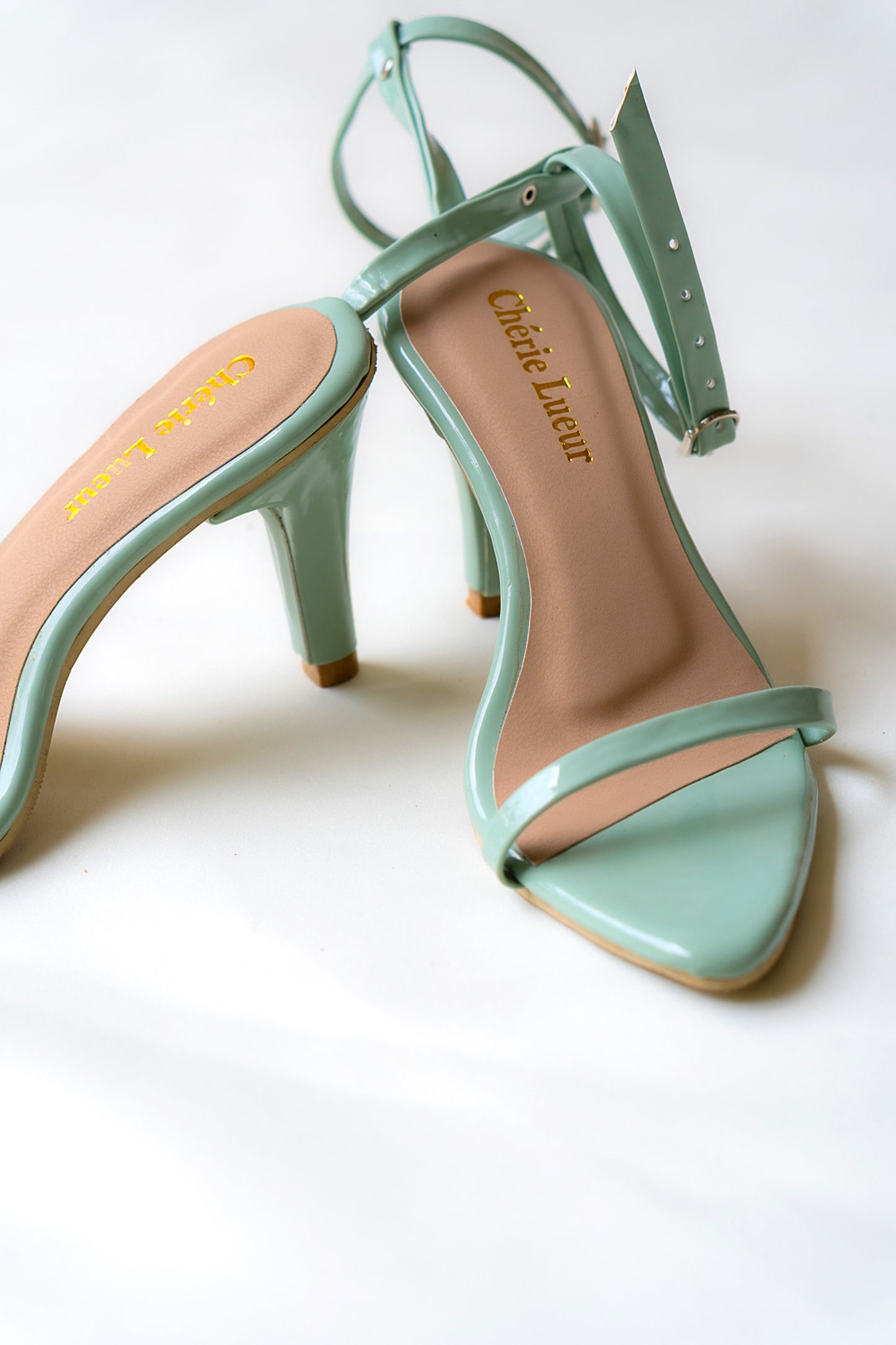 Charming mint green heel with a stylish 3-inch lift