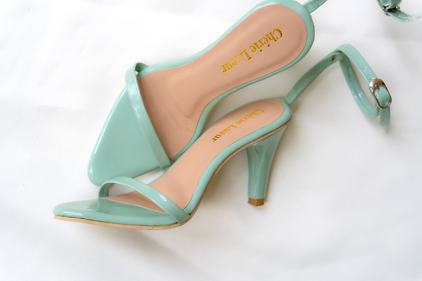 Charming mint green heel with a stylish 3-inch lift