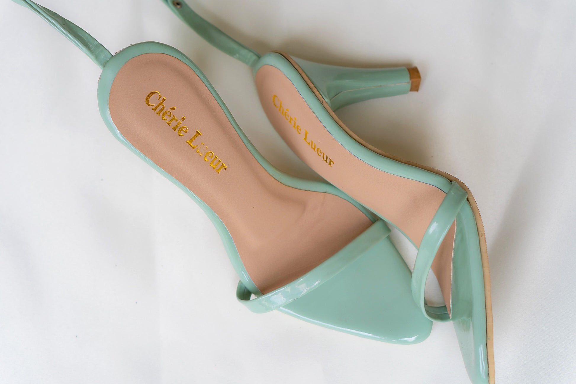 Charming mint green heel with a stylish 3-inch lift