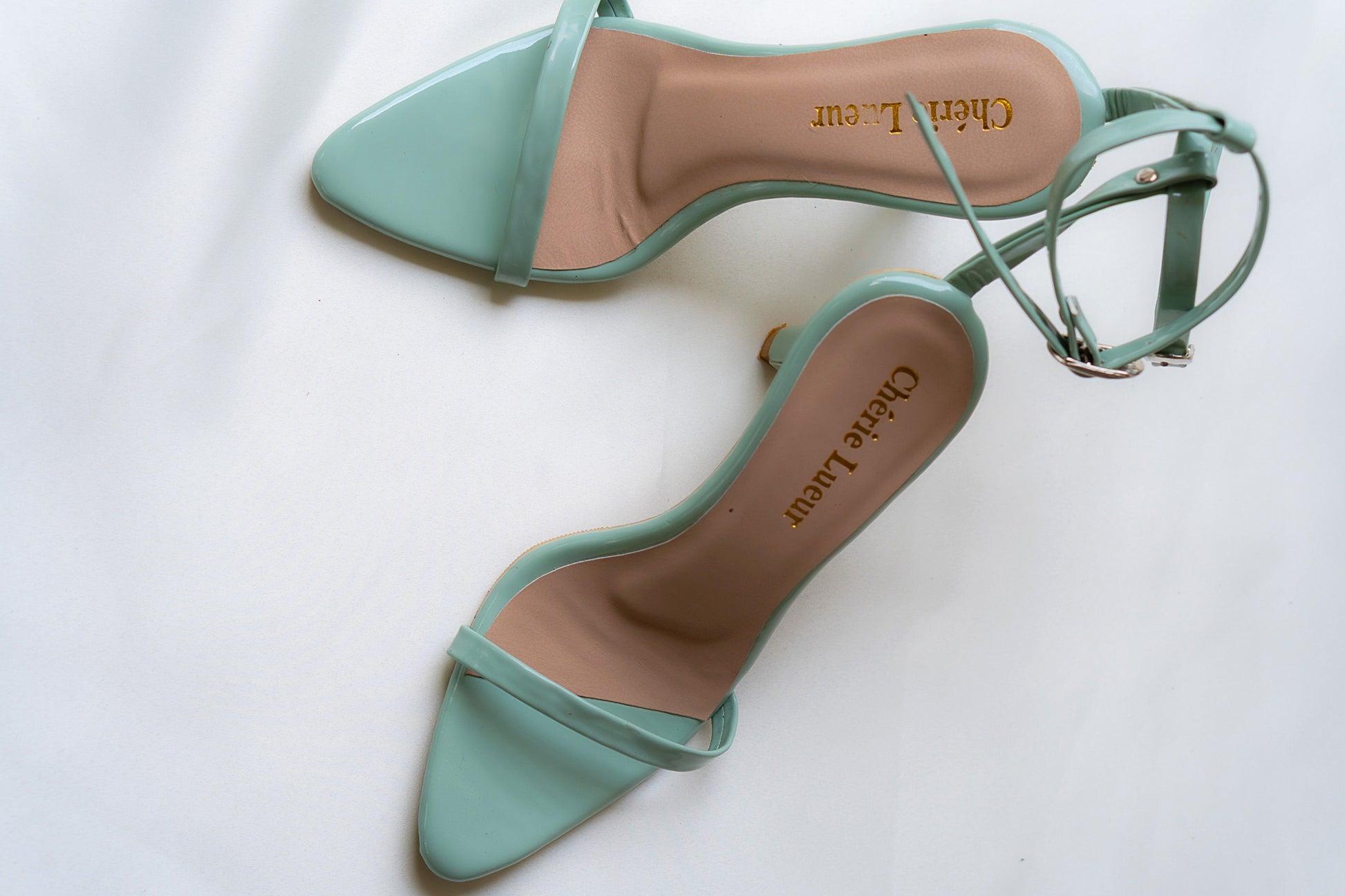 Charming mint green heel with a stylish 3-inch lift