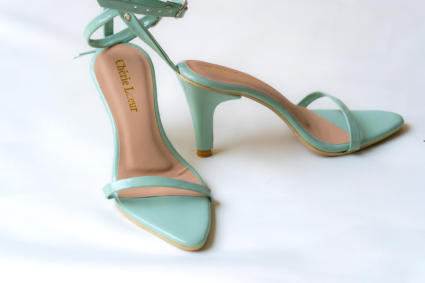 Charming mint green heel with a stylish 3-inch lift