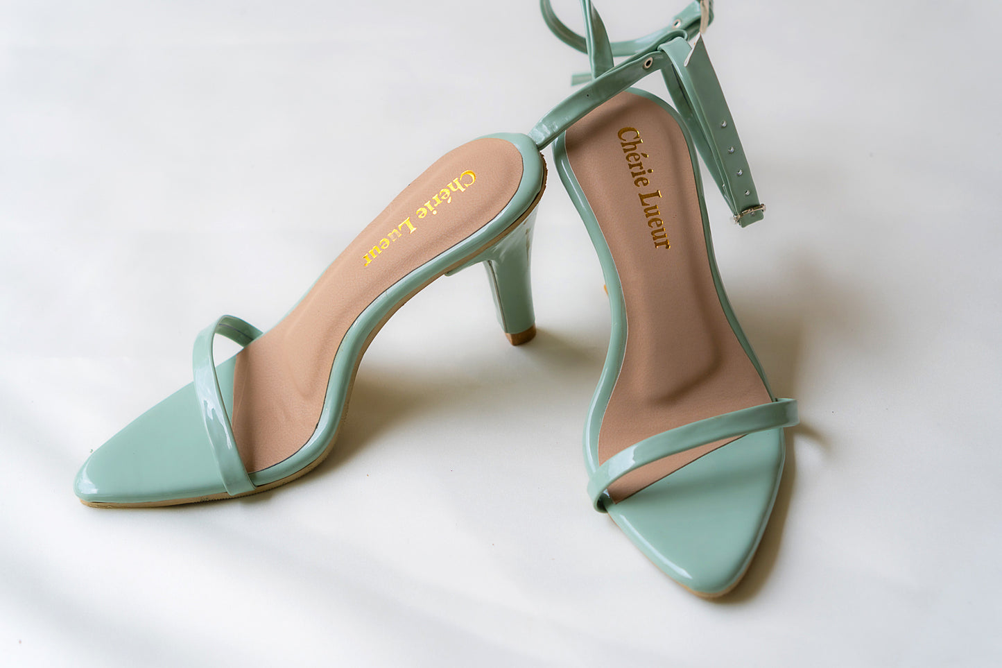 Charming mint green heel with a stylish 3-inch lift