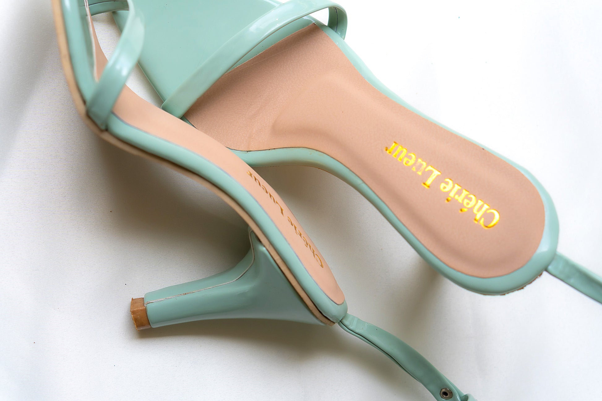 Charming mint green heel with a stylish 3-inch lift