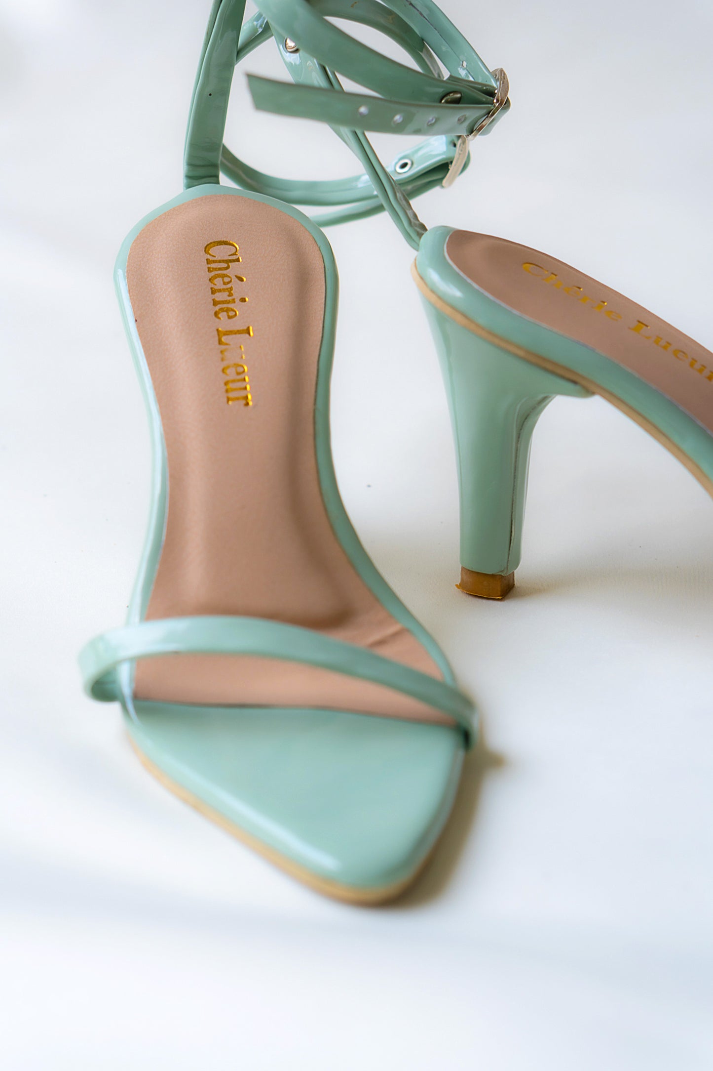 Charming mint green heel with a stylish 3-inch lift