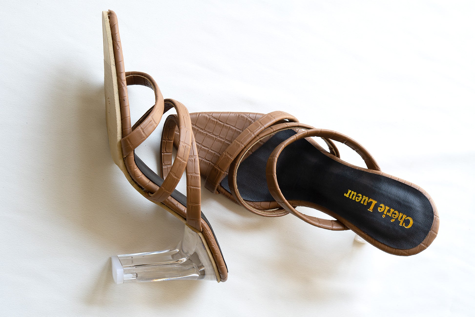 Chic Tan crocodile-print heel with a sleek 3-inch transparent heel