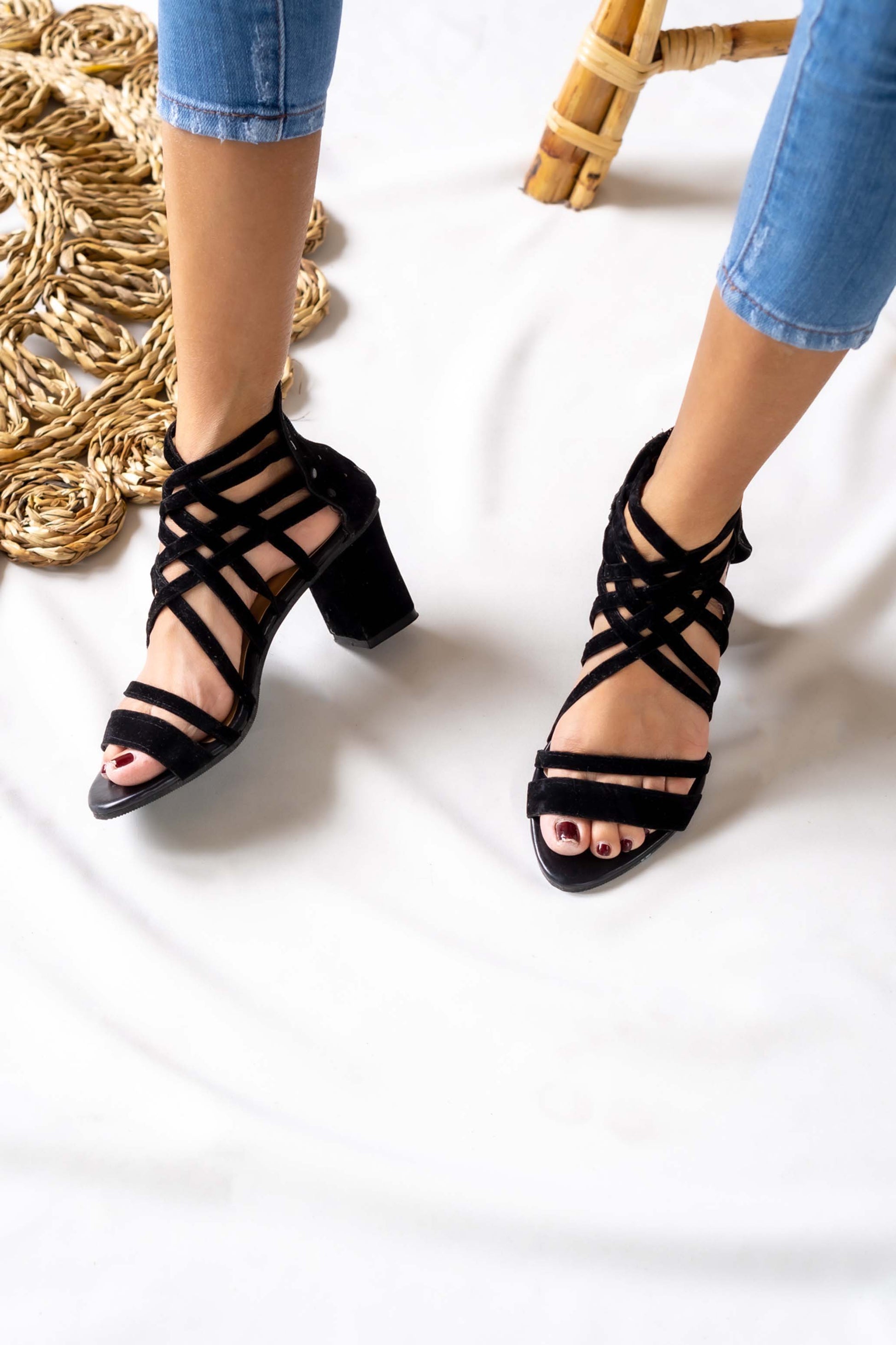Strappy and bold, this gladiator-style box heel adds a touch of edgy elegance to any look